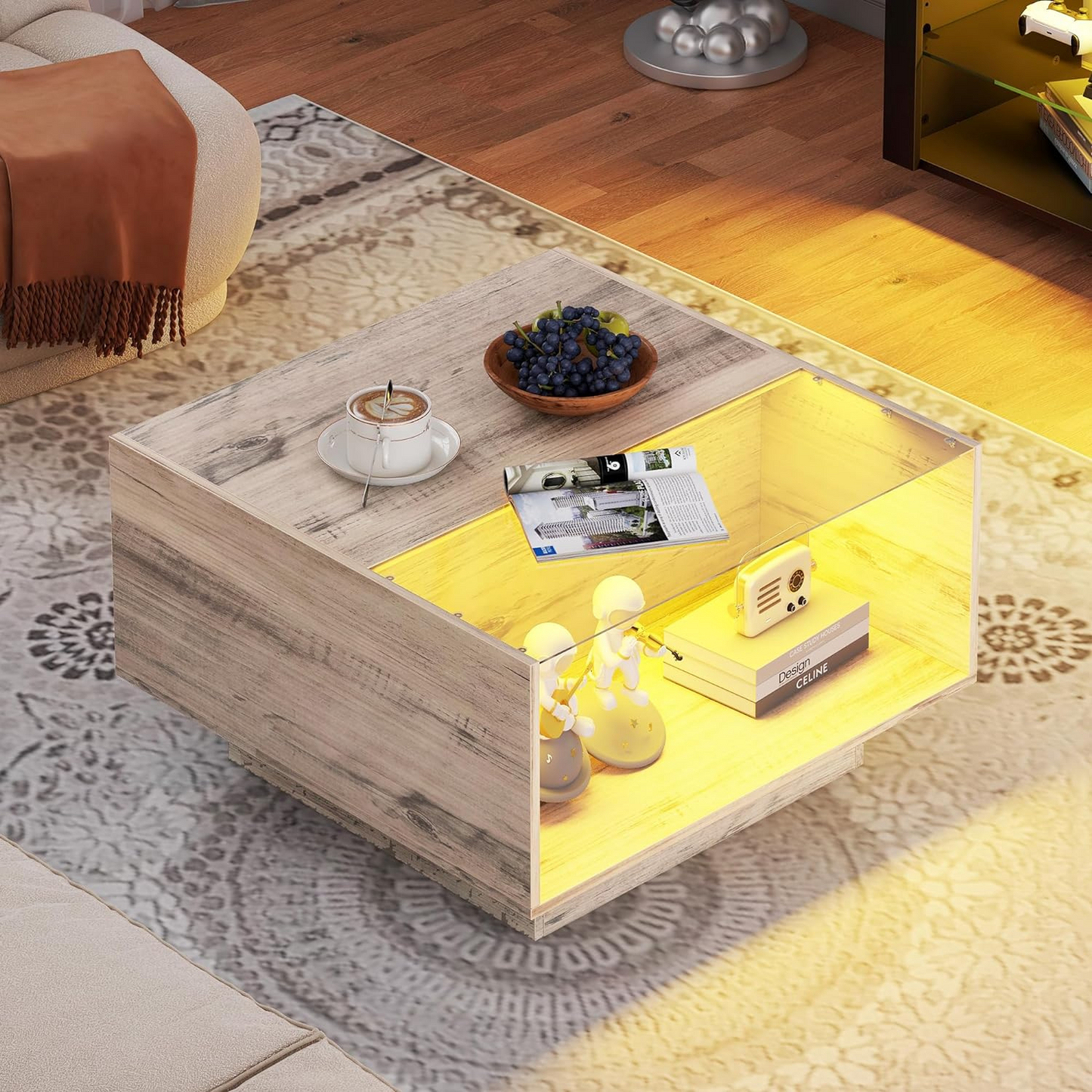 Coffee Table with LED Glass Display for Living Room | Light Wood from AHF Depot - Modern light wood coffee table featuring an LED glass display case, illuminated and positioned in the center of a stylish living room background.