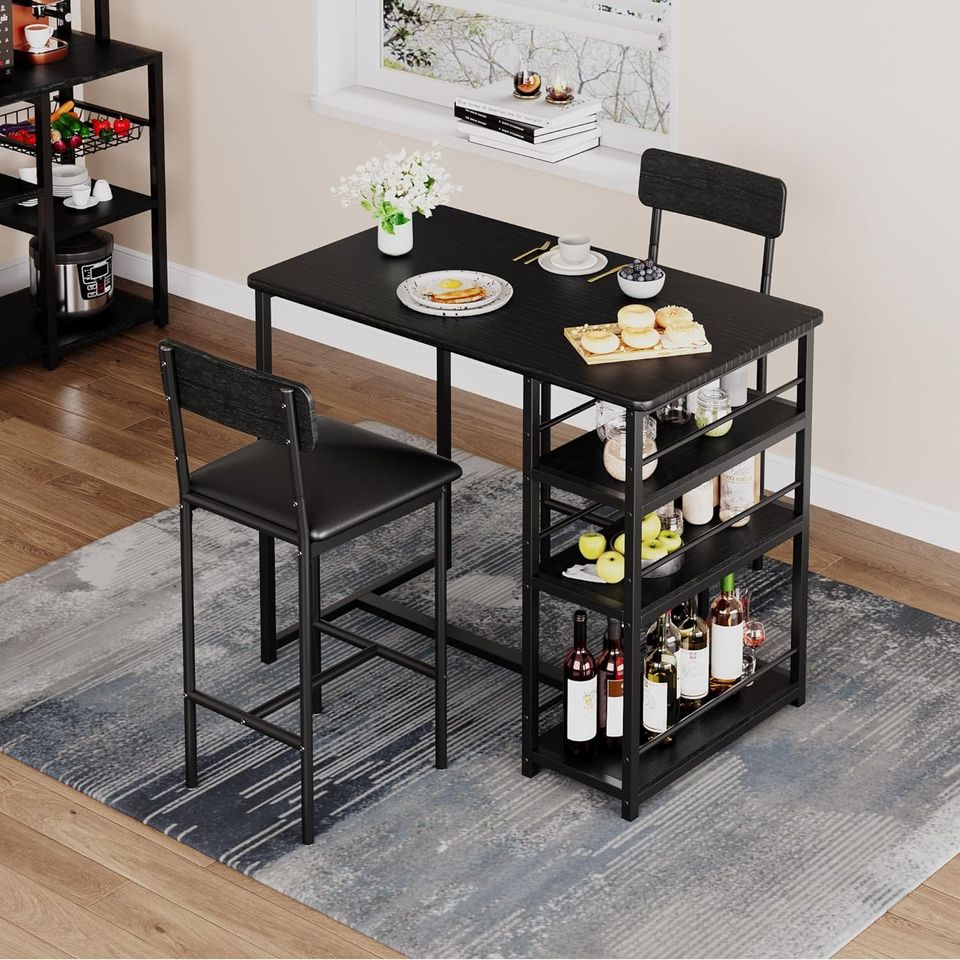 Dining Set Includes Table and Chairs for Kitchen | Black Bar Style from AHF Depot - Dining set featuring a modern black bar-height table with two chair stools and built-in shelving, complemented by breakfast essentials and flowers in a stylish indoor dining room scene.