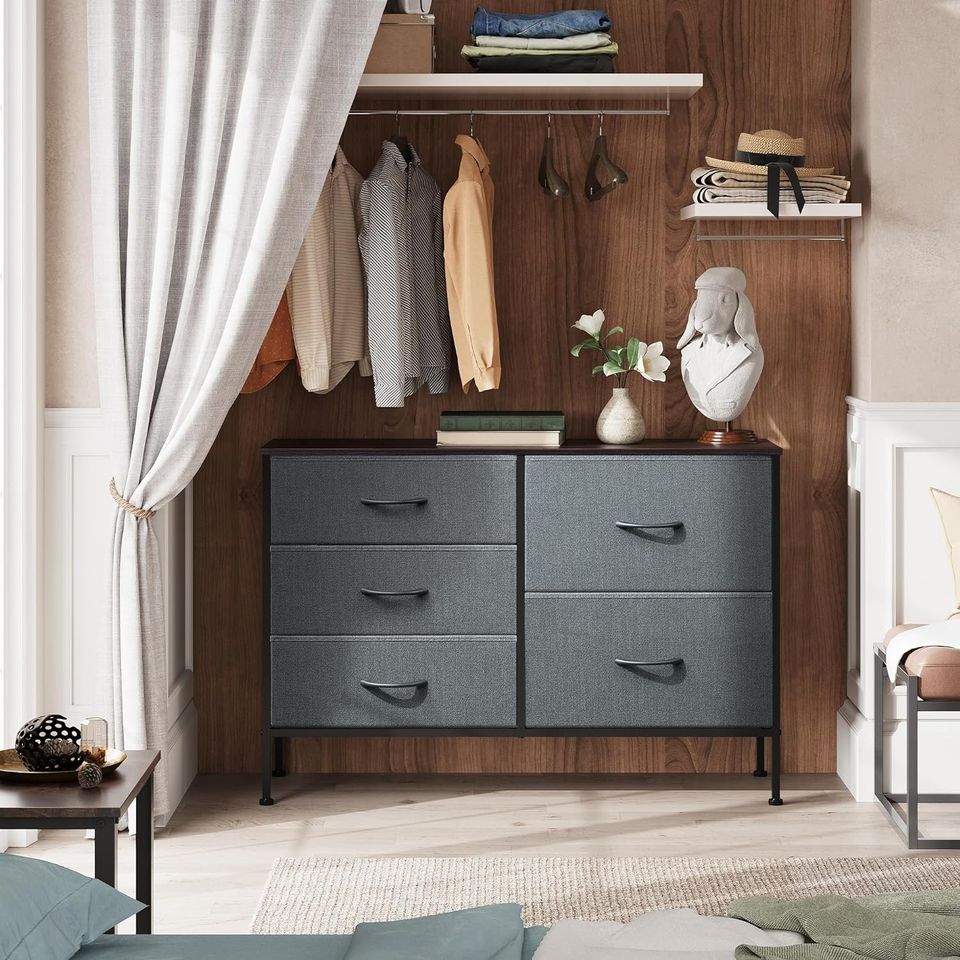 Dresser with 5 Drawers for Bedroom | Redesigned Grey from AHF Depot - Grey 5 drawer dresser in a modern bedroom setting against a oak wood panel wall. 