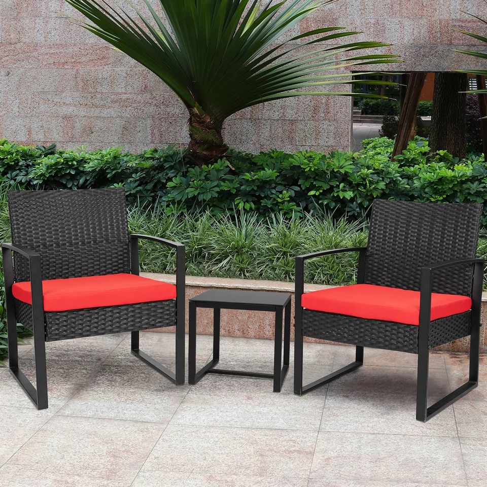 Outdoor Patio Chairs and Table Set | Black/Red from AHF Depot - Modern black frame patio conversation set with red cushions and small glass top table, set against a sunny outdoor patio setting.