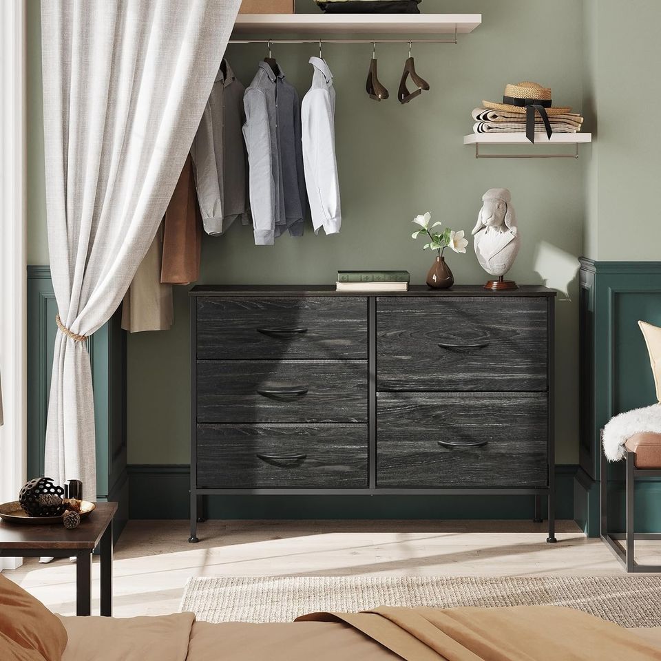 Dresser with 5 Drawers for Bedroom | Redesigned Black Wood Pattern from AHF Depot - Black wood pattern 5 drawer dresser in a modern bedroom setting against a green wall.