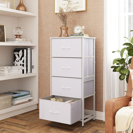 Side Table/End Table with 4 Drawers for Bedroom Storage | White from AHF Depot - White 4 drawer side table in a modern light tone living room setting with one drawer open against a wood grain wall.