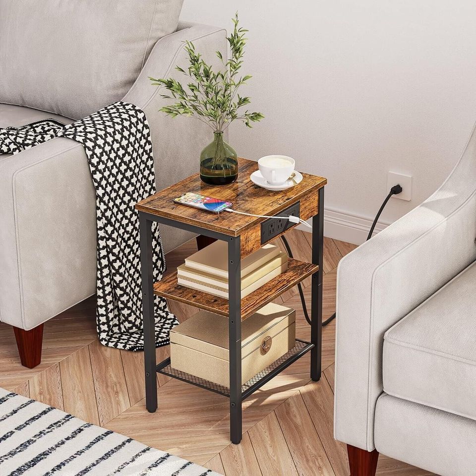 Side Table/End Table with Charging Station for Bedroom Storage | Wood Pattern from AHF Depot - Wood pattern side table with charging station in a modern light tone living room setting plugged in between two chairs.