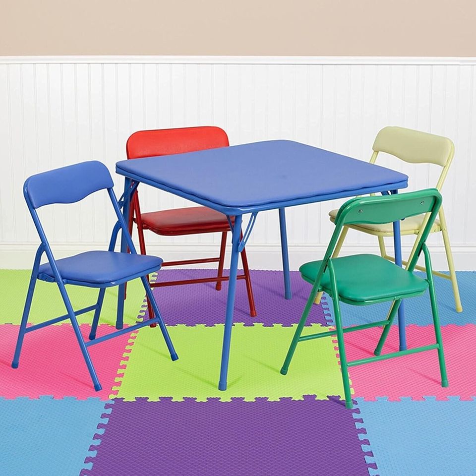 Table and Chairs Kids Folding Play Set | Multicolor from AHF Depot - Children's table and chairs multicolor set for daycares and playtime in an empty room on top of kids play-mat. 