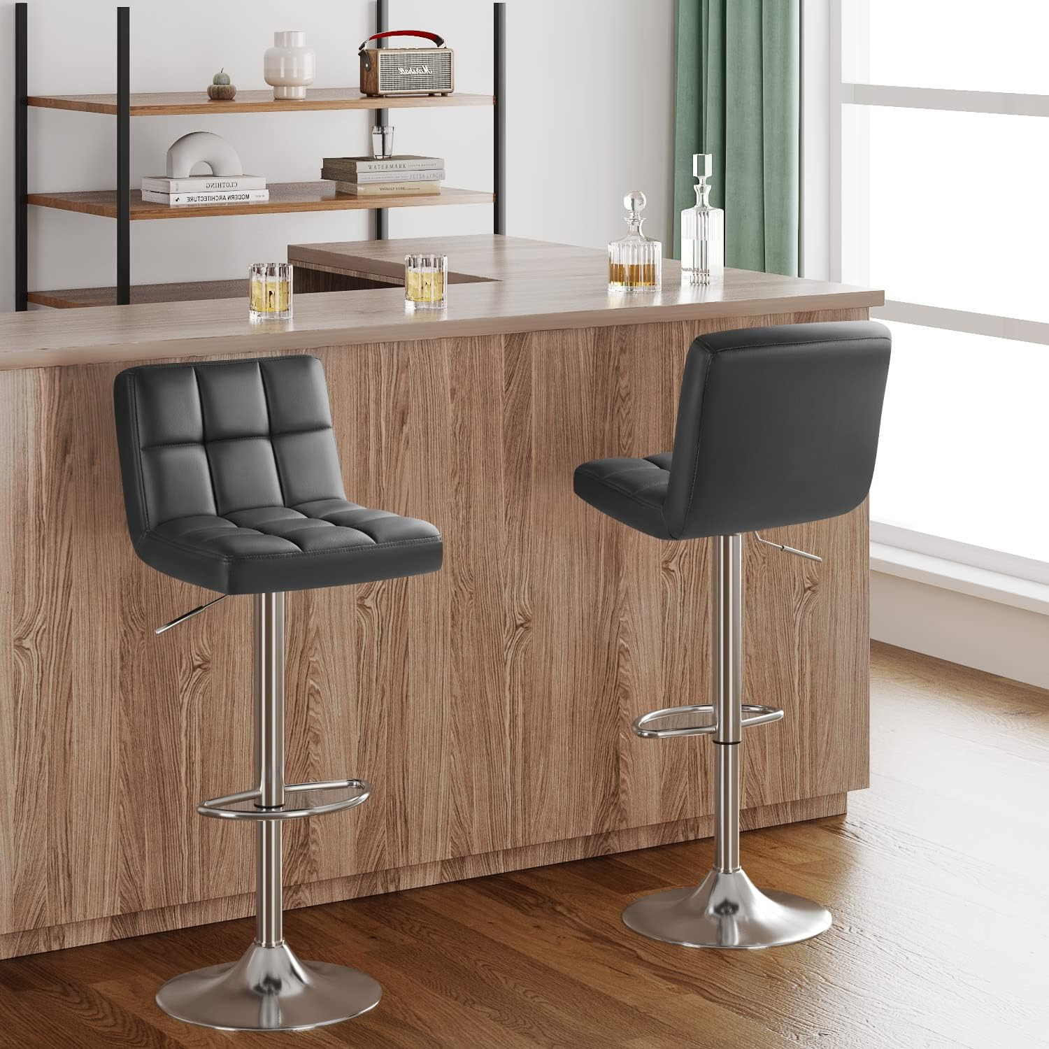 Bar Stool Set of Two with 360 Swivel and Adjustable Height for Kitchen | Grey Faux Leather from AHF Depot - Two modern grey bar stools placed in a modern kitchen setting, positioned next to a countertop.