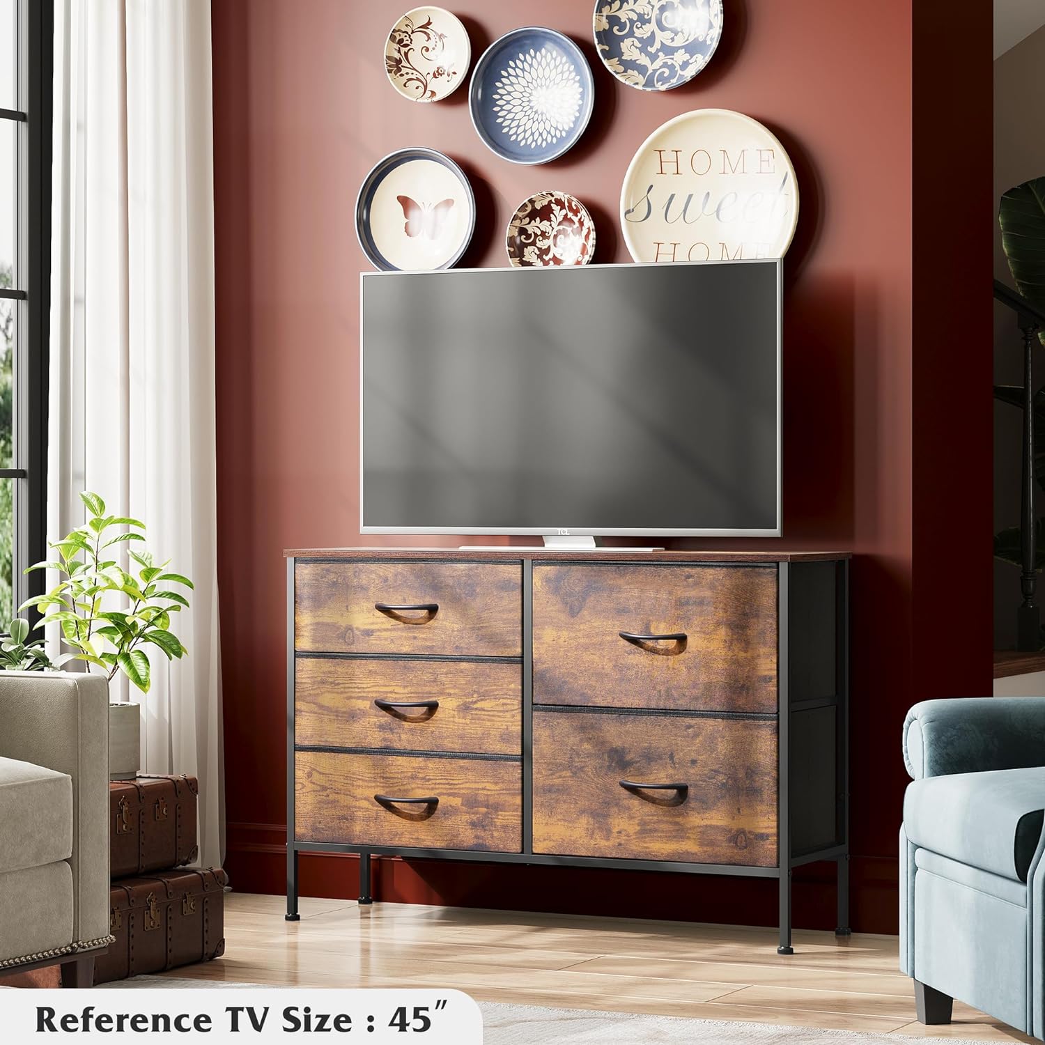 Dresser with 5 Drawers for Bedroom | Redesigned Wood Pattern from AHF Depot - Wood pattern 5 drawer dresser in a modern bedroom setting against a deep red wall with a tv on the dresser.