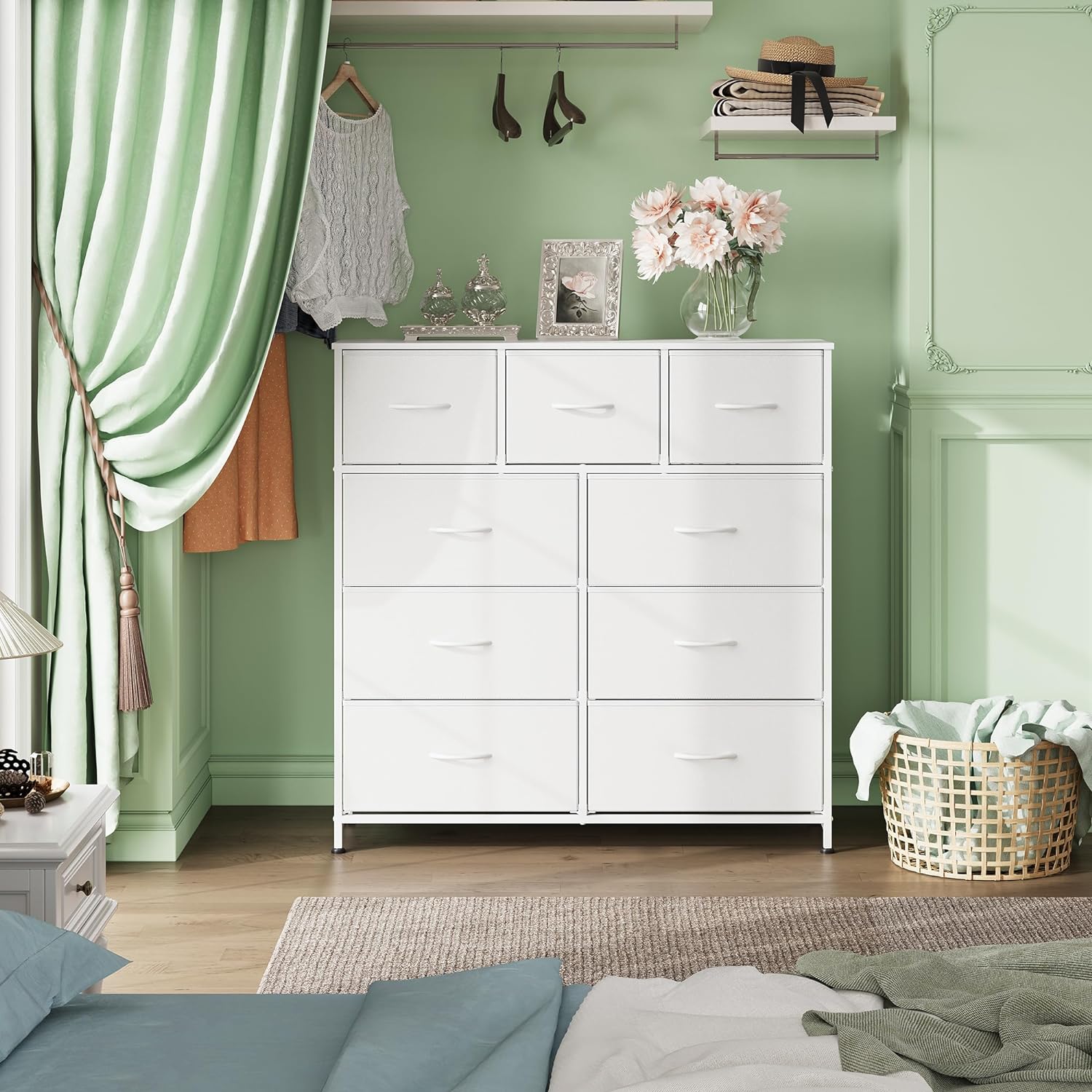 Dresser with 9 Drawers for Bedroom | White from AHF Depot - White 9 drawer dresser in a modern light tone bedroom setting against a light green wall.