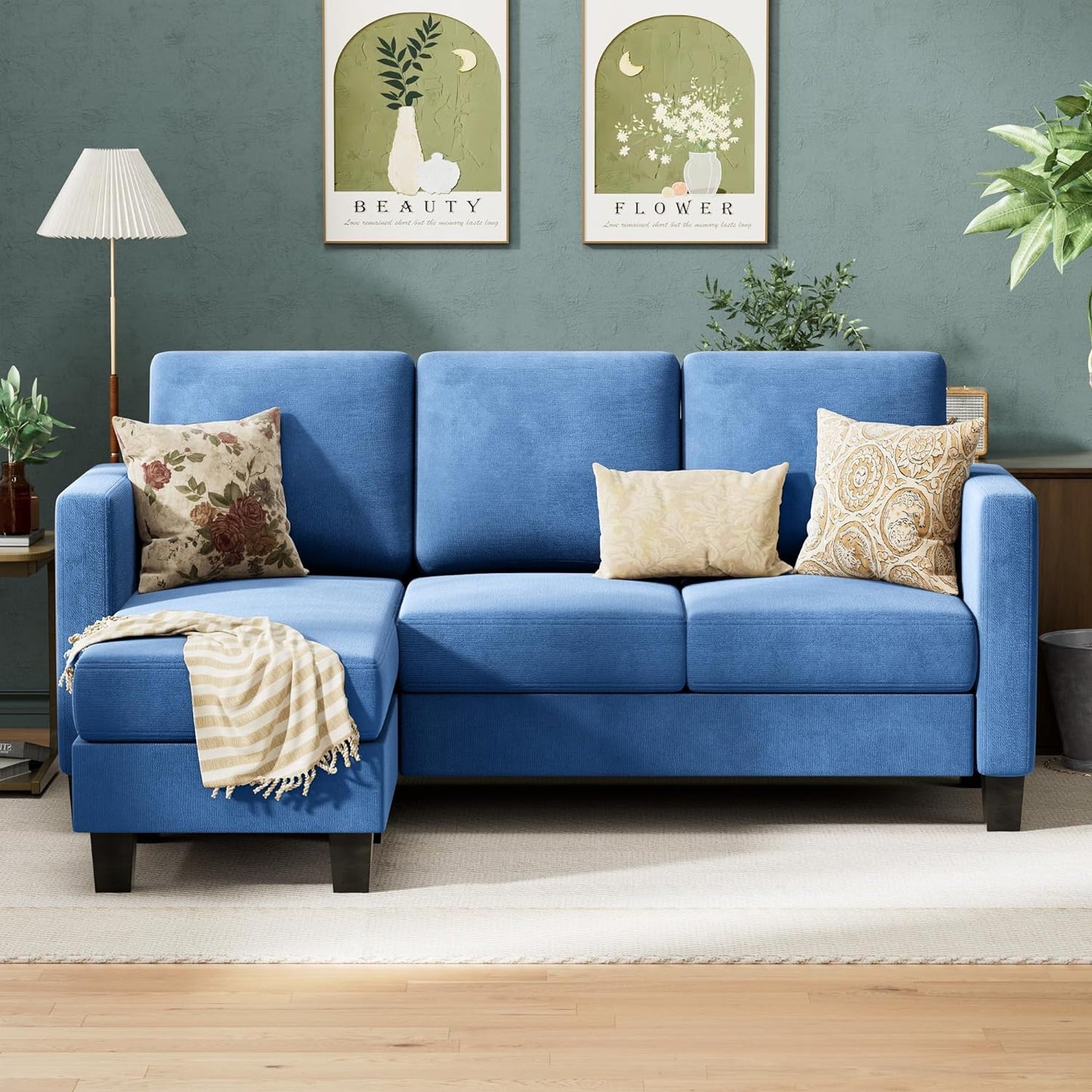 Couch Sectional Sofa with Ottoman for Living Room | Blue from AHF Depot - Blue sectional sofa with a right-side chaise, placed in front of a green wall in a modern living room scene. 