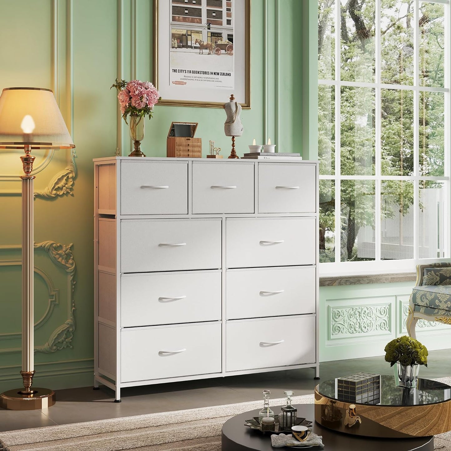 Dresser with 9 Drawers for Bedroom | White from AHF Depot - White 9 drawer dresser in a modern light tone bedroom setting against a light green wall.