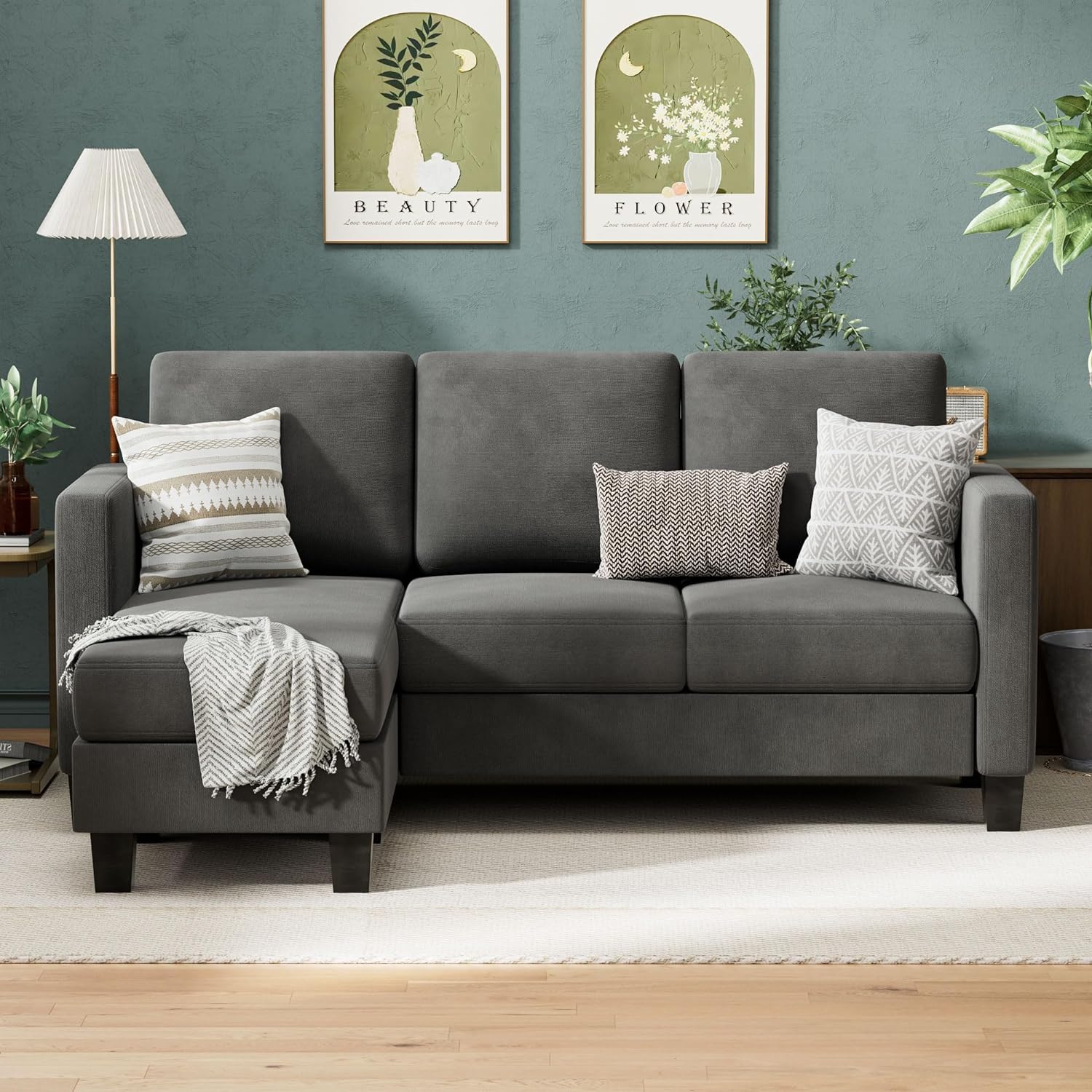 Couch Sectional Sofa with Ottoman for Living Room | Dark Grey from AHF Depot - Dark Grey sectional sofa with a right-side chaise, placed in front of a green wall in a modern living room scene.