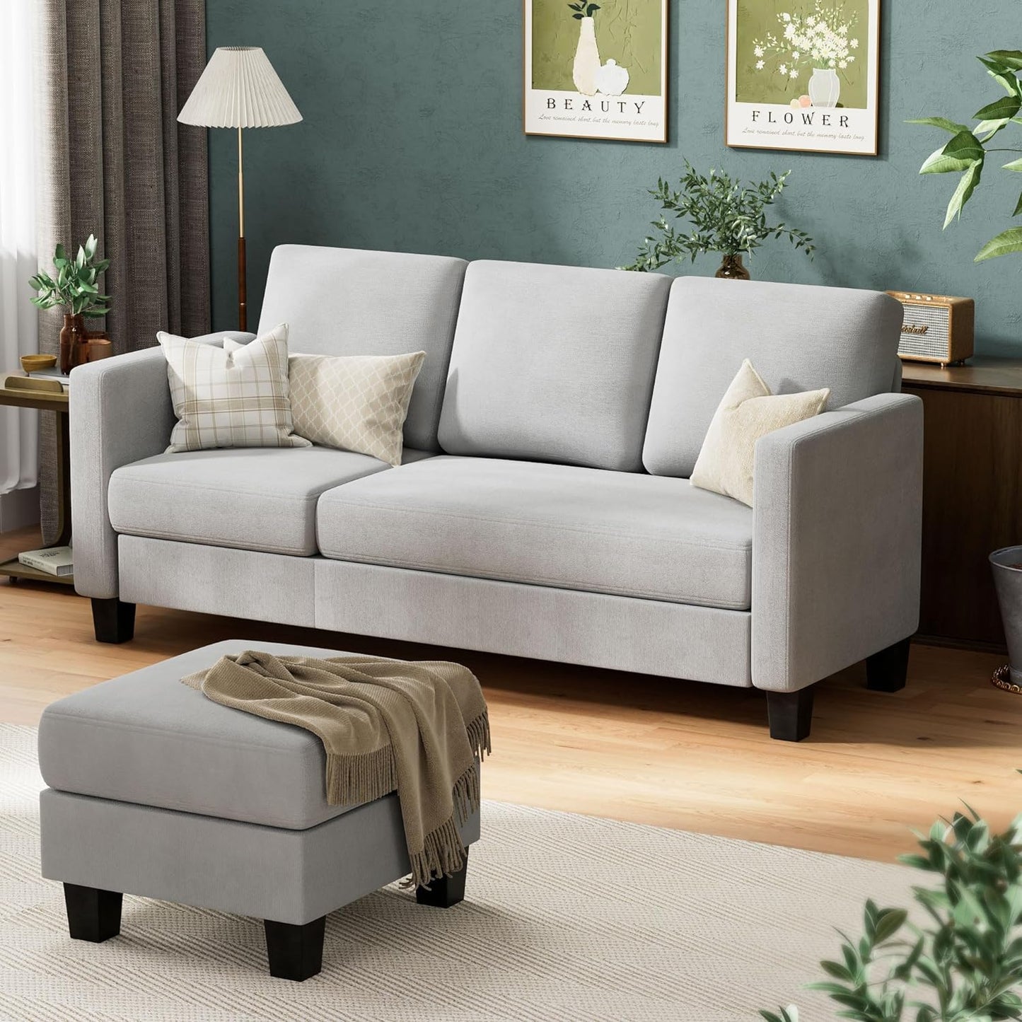 Couch Sectional Sofa with Ottoman for Living Room | Grey from AHF Depot - Grey sectional sofa with disconnected chaise used as an independant ottoman, placed in front of a green wall in a modern living room scene.