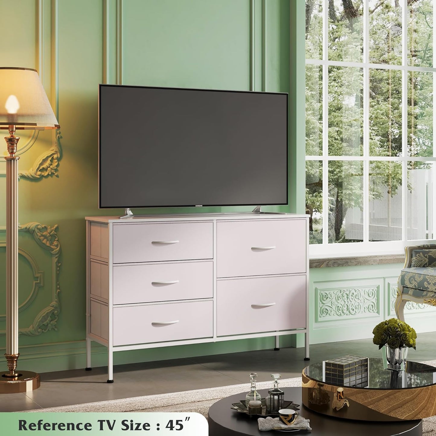 Dresser with 5 Drawers for Bedroom | Redesigned White from AHF Depot - White 5 drawer dresser in a modern bedroom setting against a light green wall with a tv on the dresser.