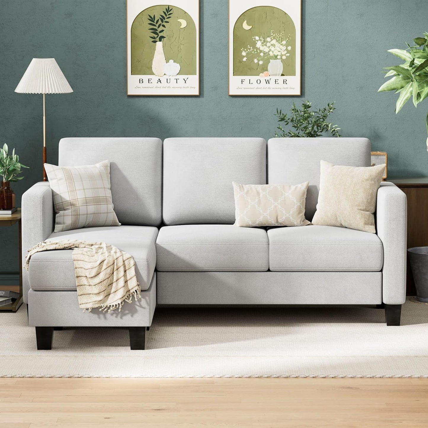 Couch Sectional Sofa with Ottoman for Living Room | Grey from AHF Depot - Grey sectional sofa with a right-side chaise, placed in front of a green wall in a modern living room scene.