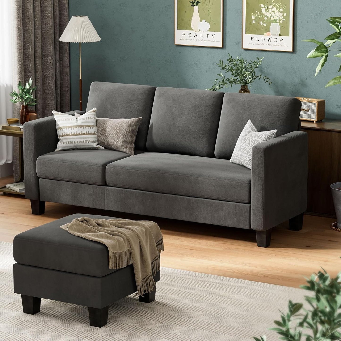 Couch Sectional Sofa with Ottoman for Living Room | Dark Grey from AHF Depot - Dark Grey sectional sofa with disconnected chaise used as an independant ottoman, placed in front of a green wall in a modern living room scene.