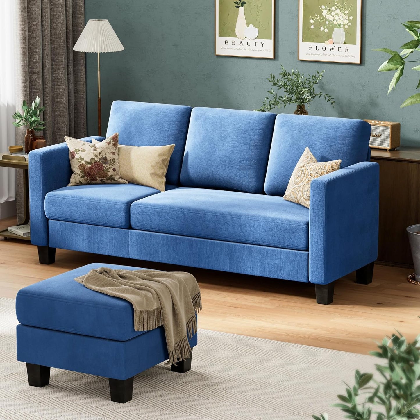 Couch Sectional Sofa with Ottoman for Living Room | Blue from AHF Depot - Blue sectional sofa with disconnected chaise used as an independant ottoman, placed in front of a green wall in a modern living room scene. 