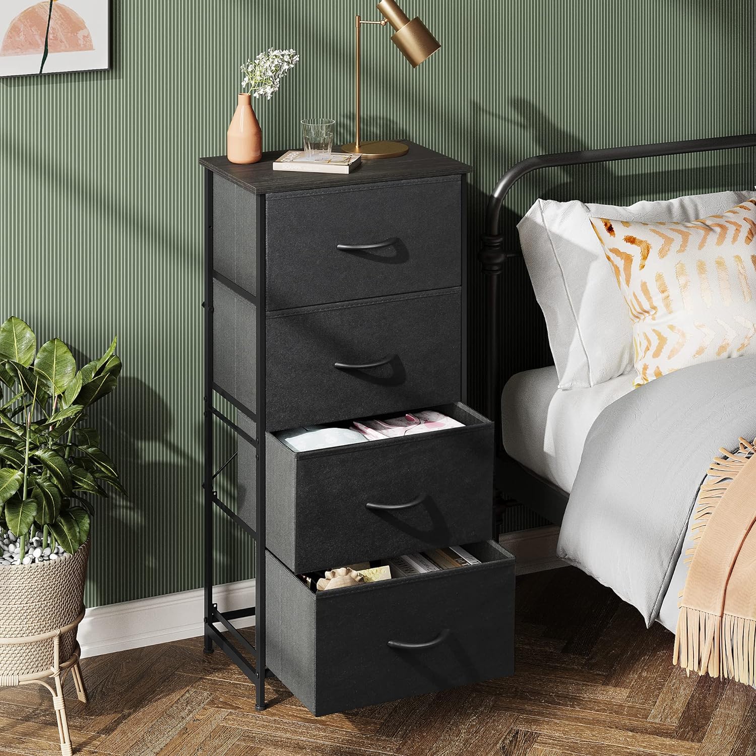 Side Table/End Table with 4 Drawers for Bedroom Storage | Black from AHF Depot - Black 4 drawer side table in a modern mid tone bedroom setting with two drawers open against a green wall.