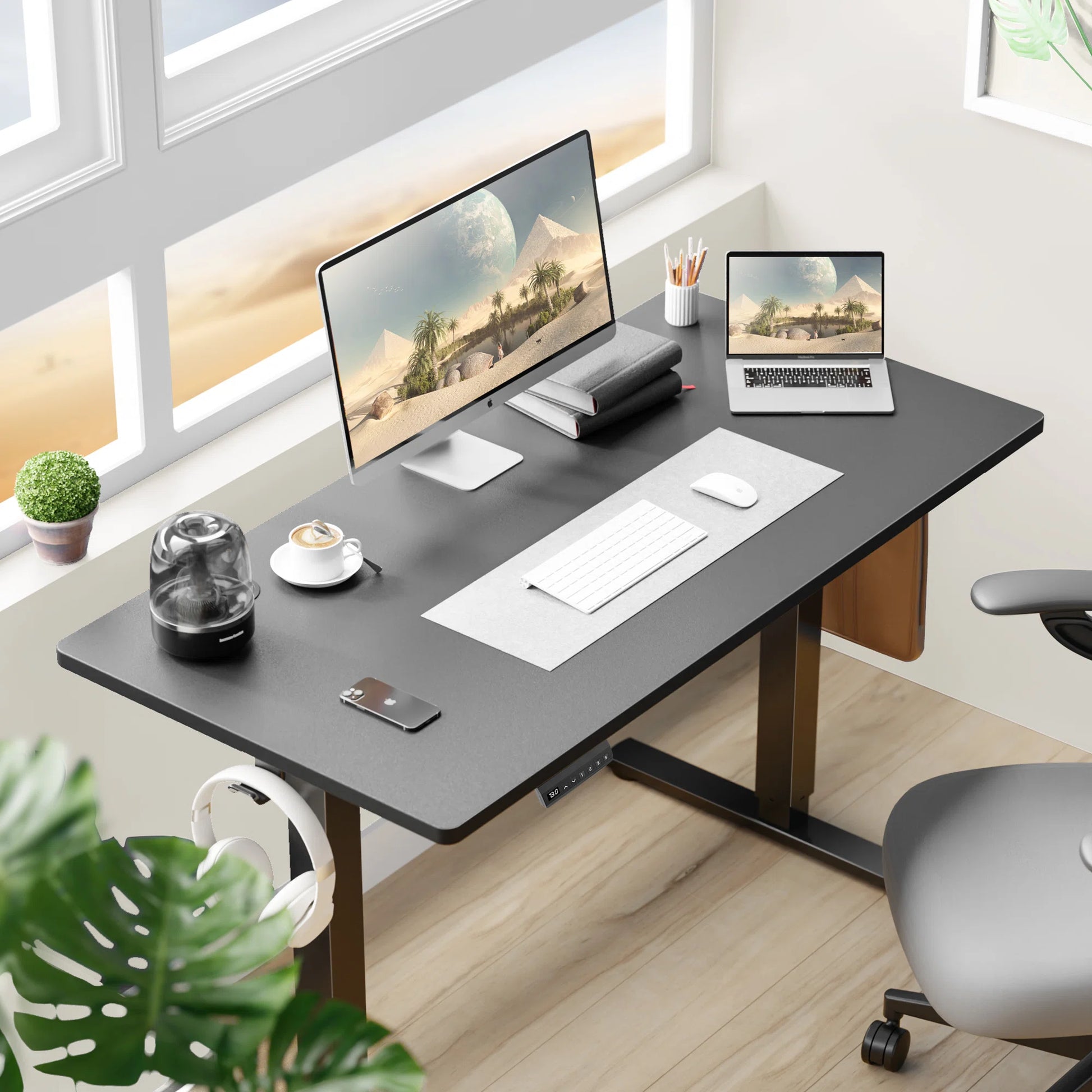 Desk for Computer PC in Office with Adjustable Height - 48" | Black from AHF Depot - Black computer desk showcased in a modern office space with computer setup, positioned in front of a window.