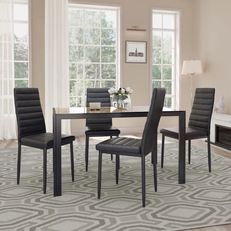 Dining Set with Table and Chairs for Kitchen | Marble Pattern from AHF Depot - Modern marble pattern dining table with four chairs, adorned with candles and flowers, set in a contemporary dining room with expansive bay windows offering a view of the outdoors.