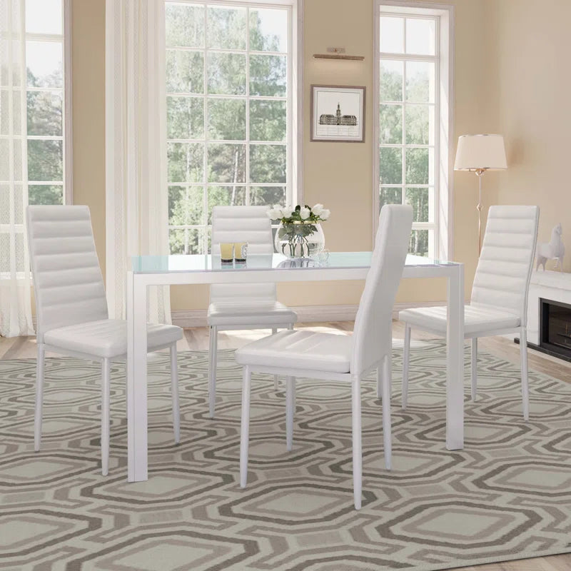 Dining Set with Table and Chairs for Kitchen | White from AHF Depot - Modern white dining table with four chairs, adorned with candles and flowers, set in a contemporary dining room with expansive bay windows offering a view of the outdoors.