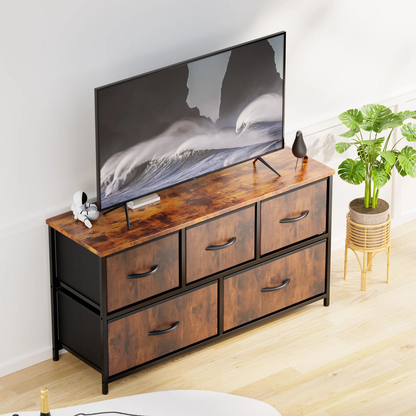 Dresser with 5 Drawers for Bedroom | Wood Pattern from AHF Depot - Wood pattern 5 drawer dresser in a modern light tone bedroom setting with a tv on the dresser. 